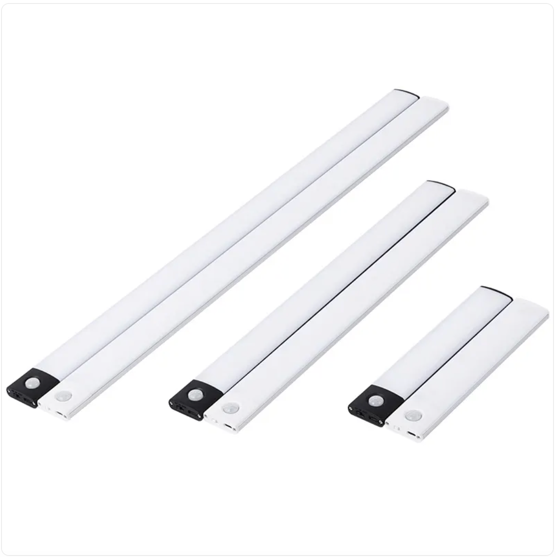 Three white LED light strips with motion sensors on a white background