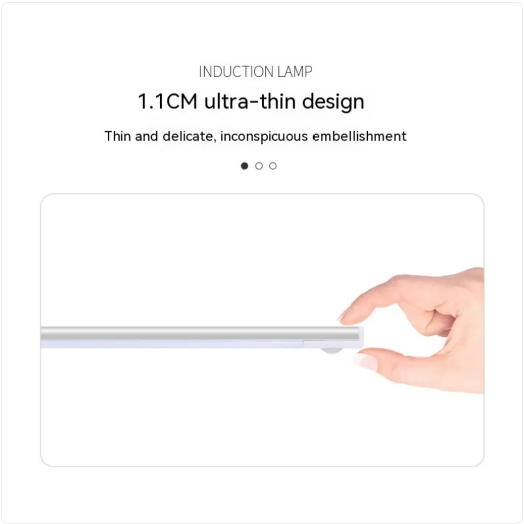 Induction lamp with a hand holding it, showcasing its thin design.
