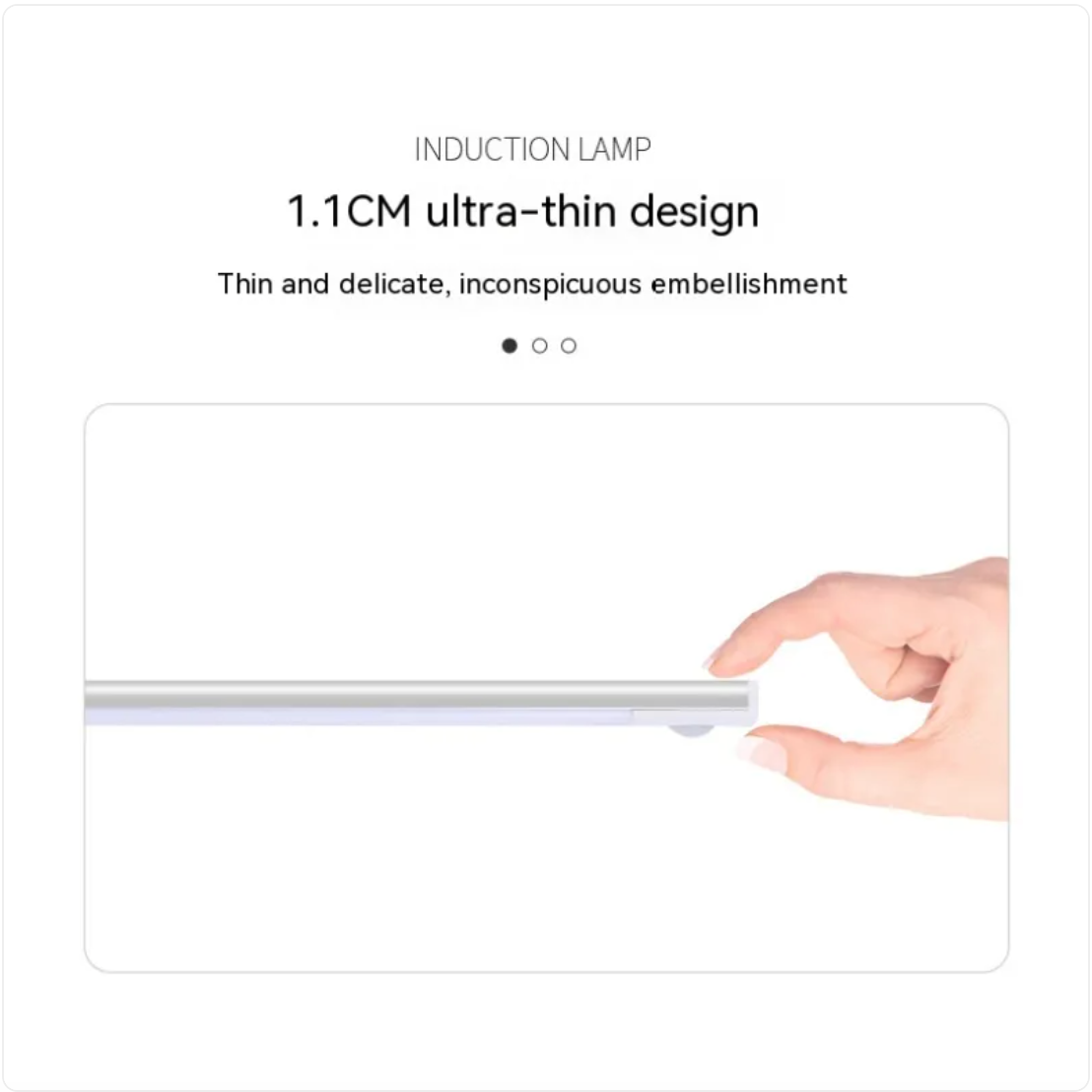 Induction lamp with a hand holding it, showcasing its thin design.